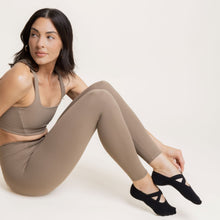 Charger l'image dans la galerie, Black Shashi grip socks worn during Pilates and functional studio workout