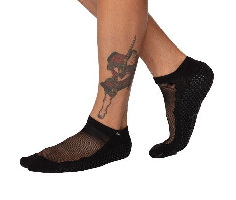 black grip socks with mesh on the upper part of the foot for pilates and yoga