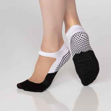 black and white grip socks with nude mesh on the upper part of feet Shashi brand