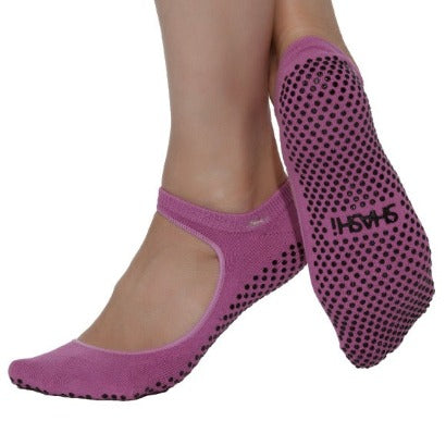 orchid pink socks with grips and a large opening on the upper part of the foot Mary Jane style